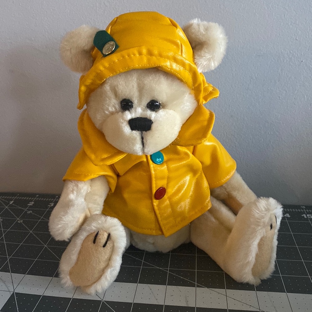 Vintage brass button jointed bear